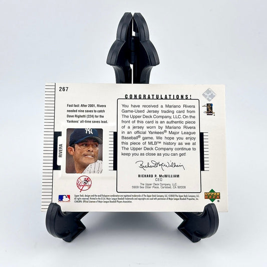 Baseball trading card with player image and text on a white background