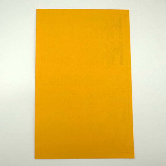 Backside of vintage handbill to show pristine condition against white background. 