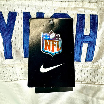 A close-up of a black hangtag with the NFL shield logo and a white Nike swoosh.
