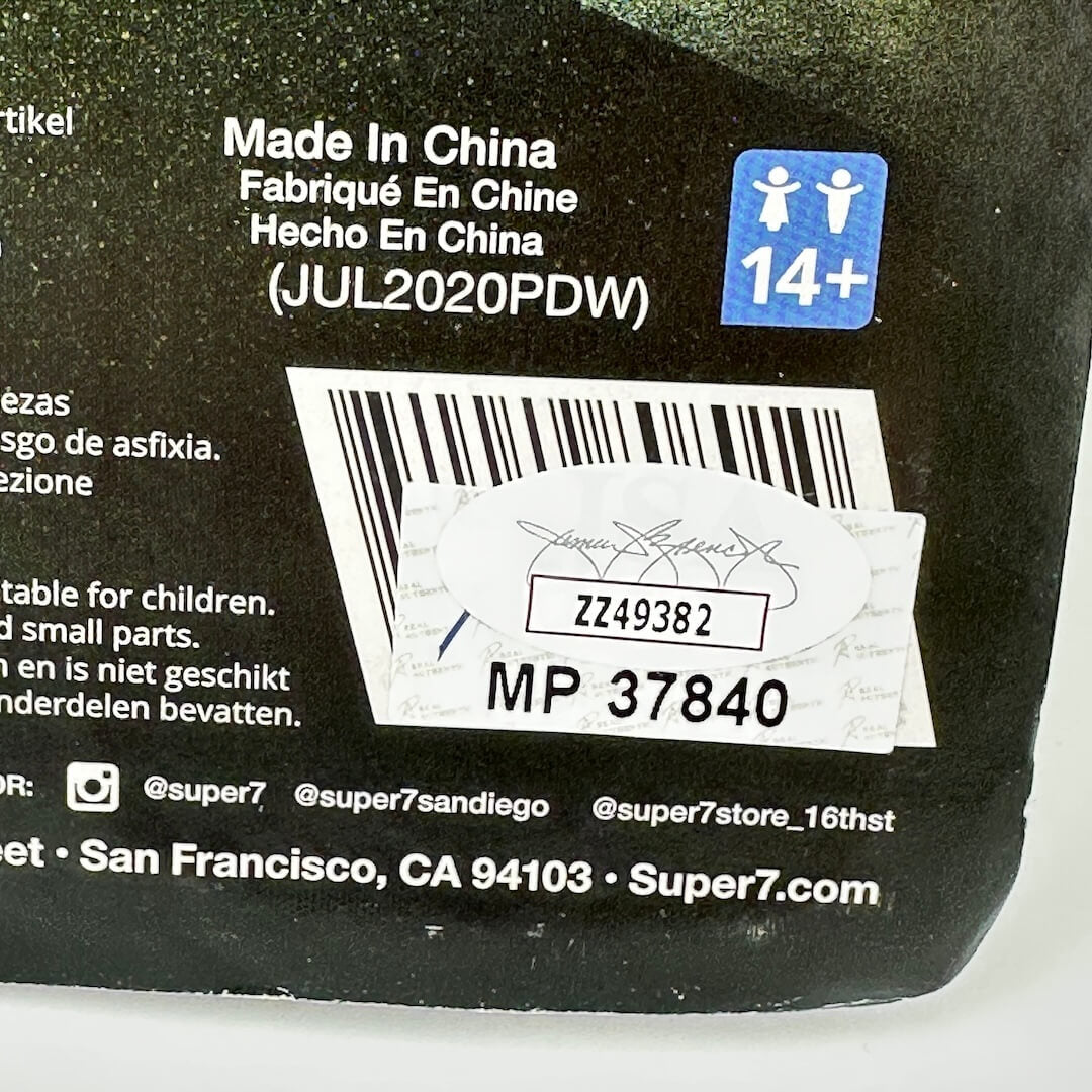 Back of a product packaging with text, barcode, and logos on a black background.