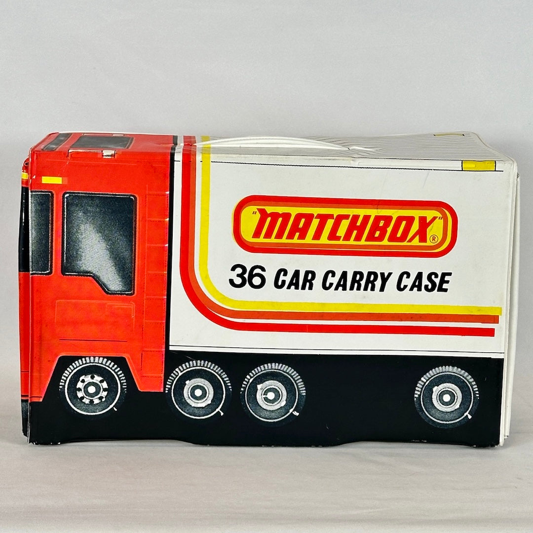 Side of case printed to look like red transport truck with white trailer with Matchbox logo.