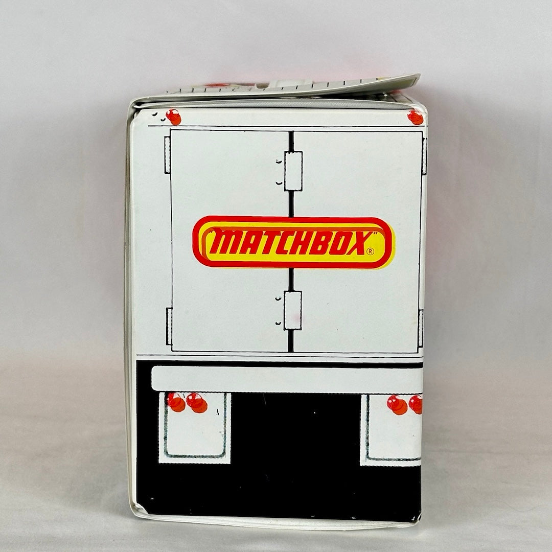 Back side of case with Matchbox logo across what is made to look like trailer doors and mudflaps.