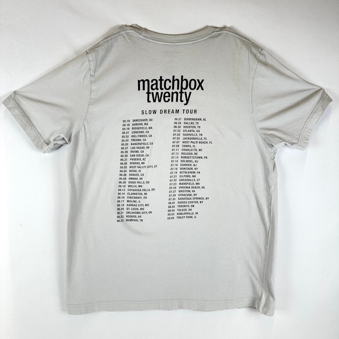 A light gray short-sleeve t-shirt, featuring 'matchbox twenty' and a 'SLOW DREAM TOUR' schedule on the back.