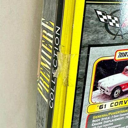 Close-up of a Matchbox model car box showing the spine and side panel with a '61 Corvette illustration and yellow trim.