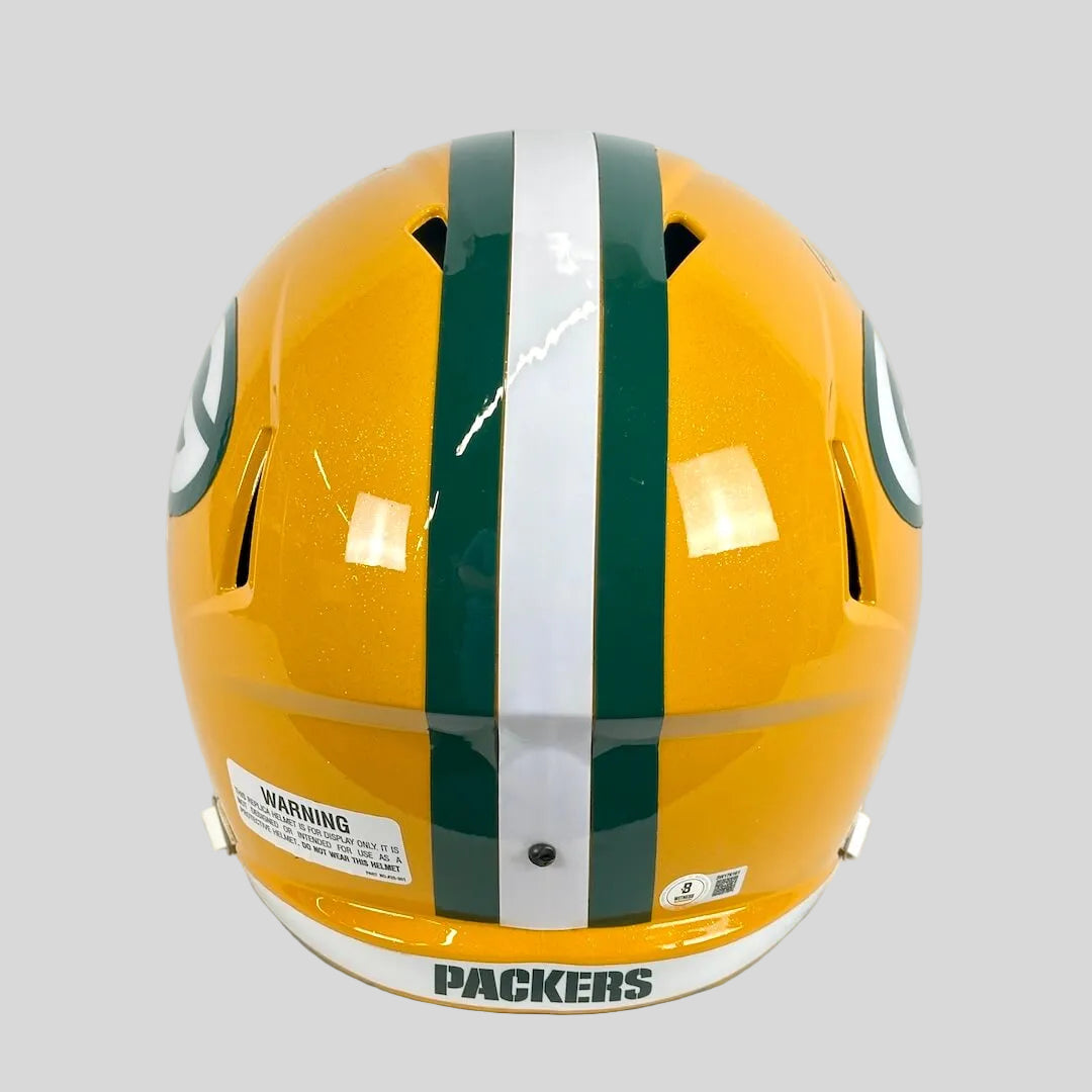 A Green Bay Packers football helmet shown from the back, featuring the team's signature yellow, green, and white color scheme.