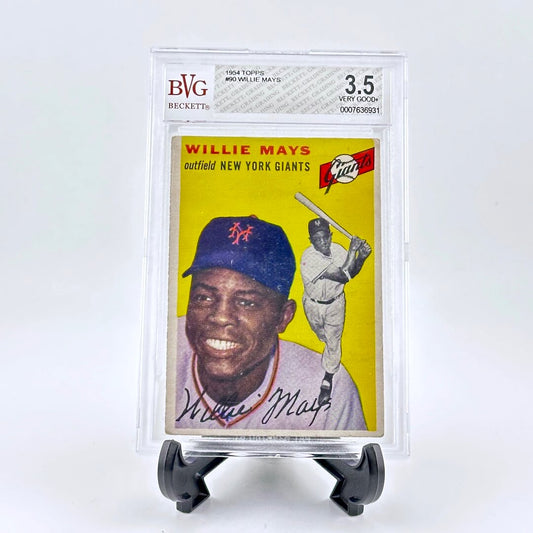 Baseball card for Willie Mays in clear plastic capsule on black easel against white background. 