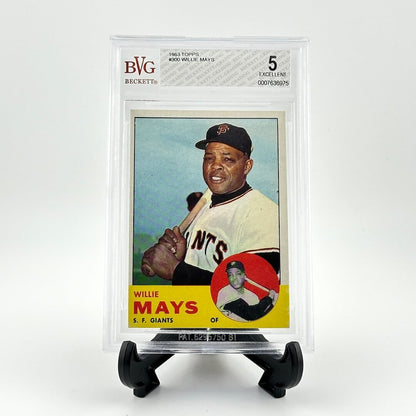 Baseball trading card of Willie Mays in a protective display case on a white background