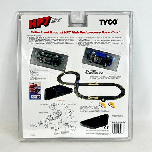 Tyco HP7 high-performance race car set packaging with instructions and graphics.
