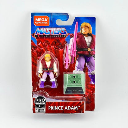 Mega Construx MOTU action figure of Prince Adam in original packaging on light background. 
