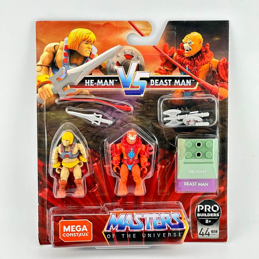 Masters of the Universe He-Man vs Beast Man action figure set in original blister packaging on light background. 
