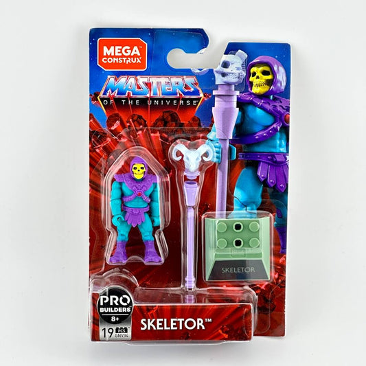 Masters of the Universe mini action figure of Skeletor in packaging with accessories on light background. 