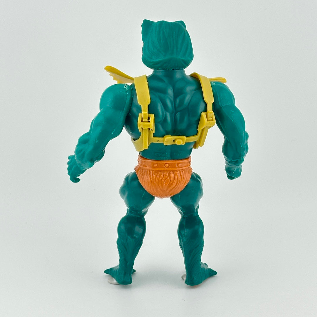Turquoise male figure in orange loincloth with fur detail, and lime green battle harness accessory.