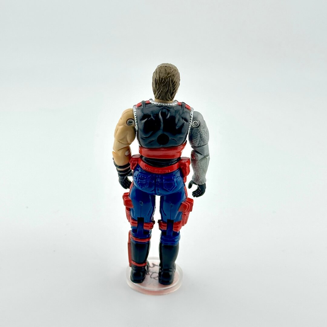 Action figure with a blue and red outfit on a white background