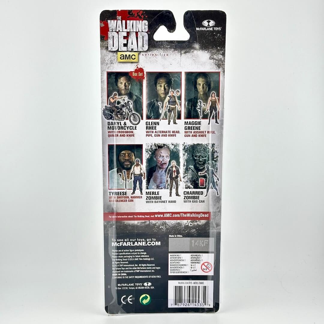 Back of a McFarlane Toys 'The Walking Dead' action figure blister card package, showing character photos and product details.
