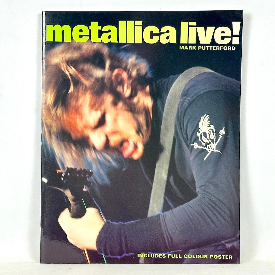 Book cover of 'Metallica Live!' featuring a person playing guitar with text on a white background