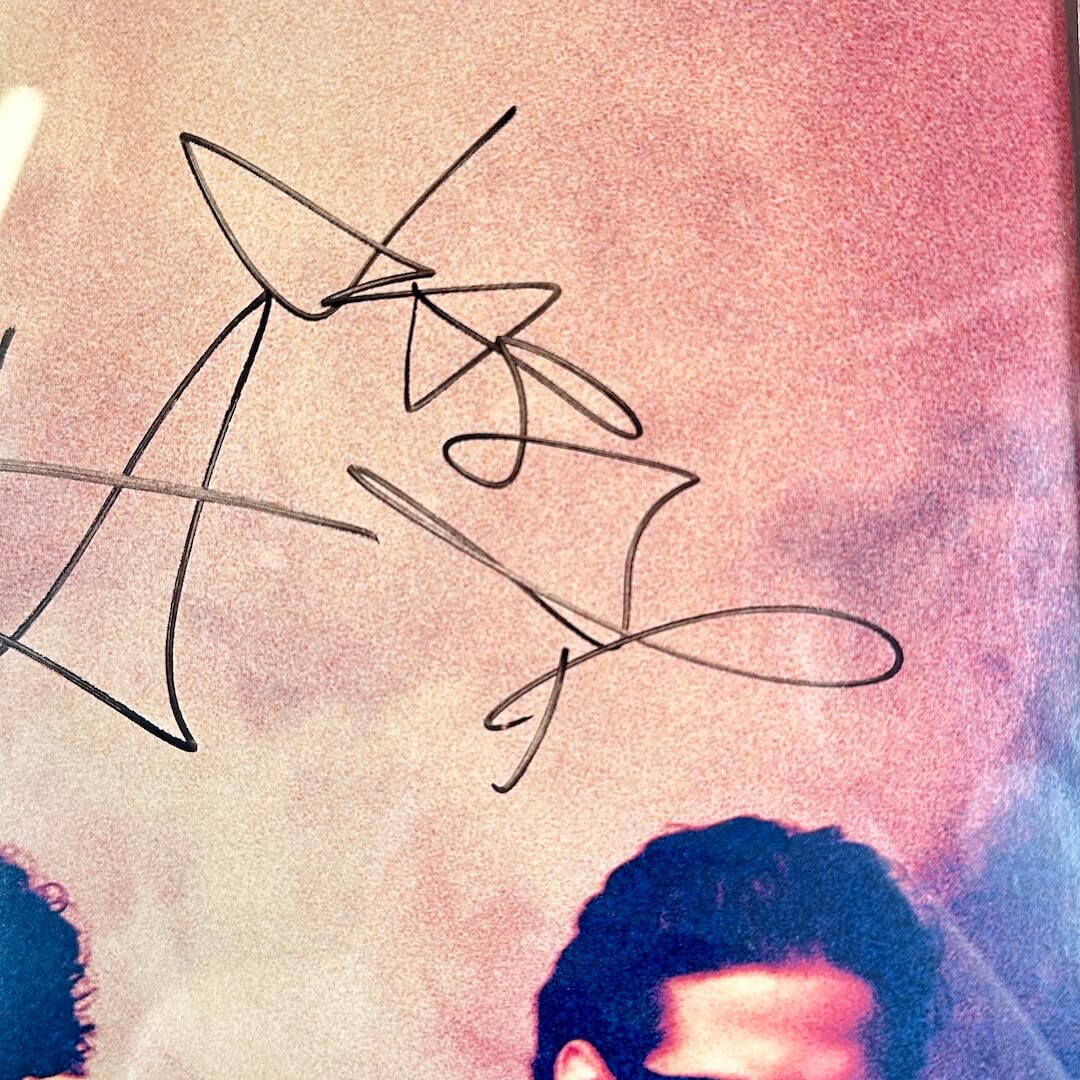 Close up of signature on poster. 