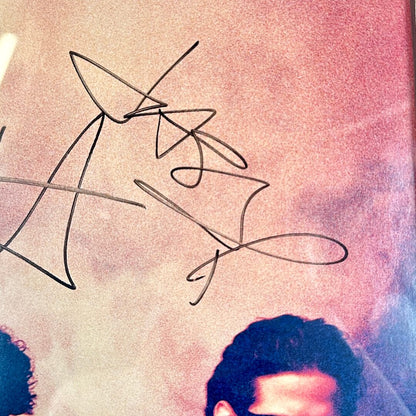 Close up of signature on poster. 