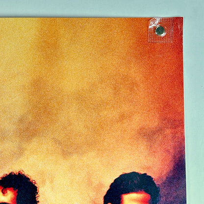 Top right corner of poster with small crease and good edges.