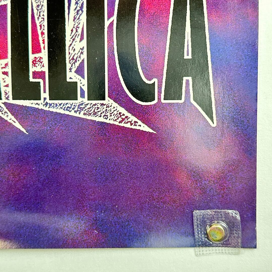 Bottom right corner of poster with no obvious damage.