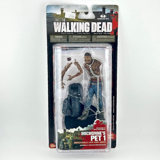 Walking Dead action figure of zombie with removable parts in original blister packaging on white background. 