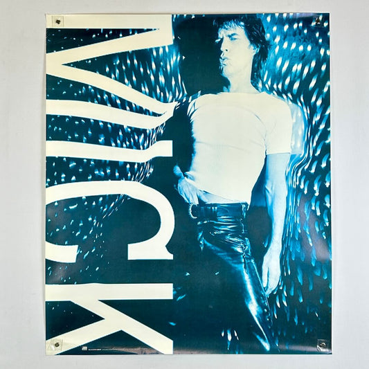 Poster of Mick Jagger in leather pants and white t-shirt with "MICK" white text along left side. 