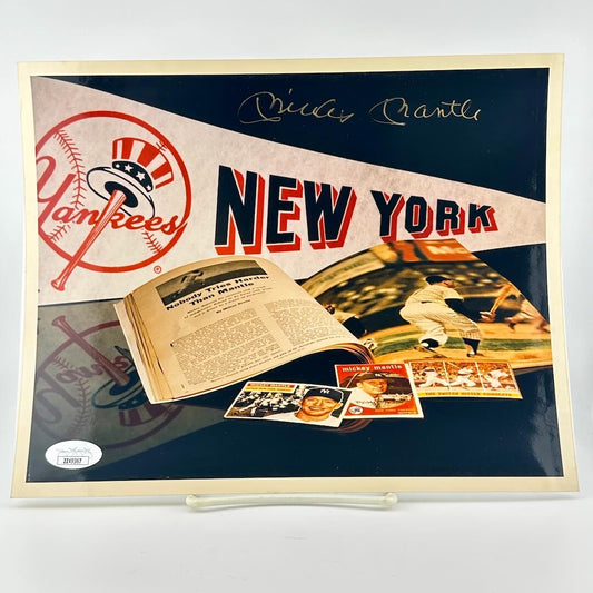 Photograph of memorabilia collage featuring signature of player, JSA authentication sticker in corner. 