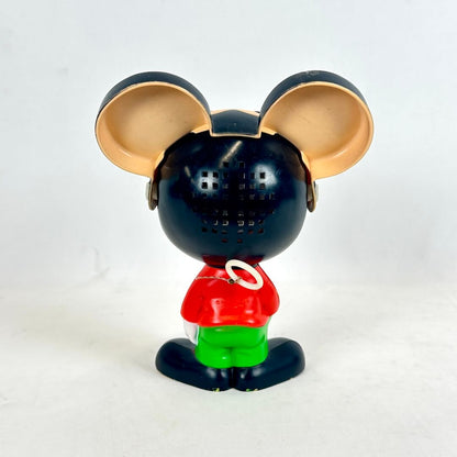 Toy figure resembling a character with large ears on a white background
