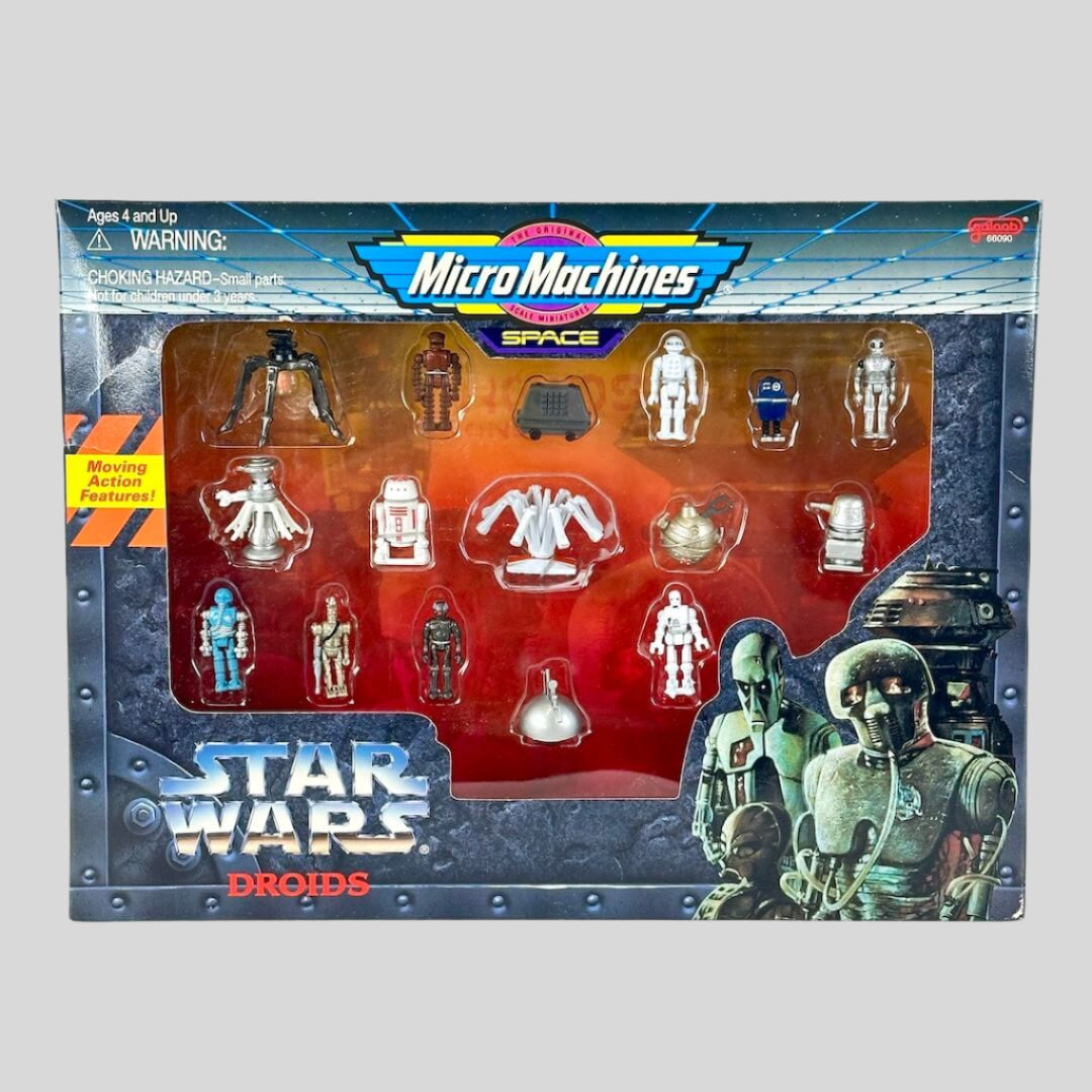 Box of Micro Machines Star Wars Droids figures with visible branding and product details.