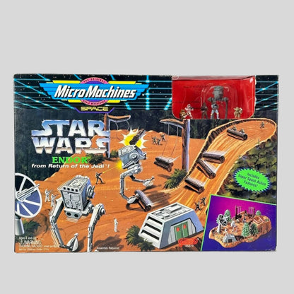 Vintage 'Micro Machines Space Star Wars' toy set packaging on a white background
