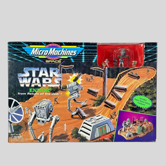 Vintage 'Micro Machines Space Star Wars' toy set packaging on a white background