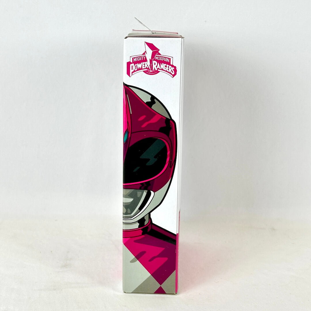 Side view of packaging with illustration of Pink Ranger under the Power Rangers logo. 