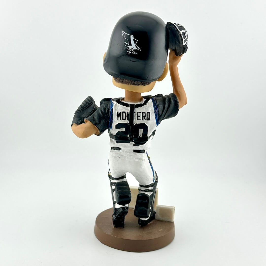 Baseball player bobblehead figure with helmet and uniform on a white background