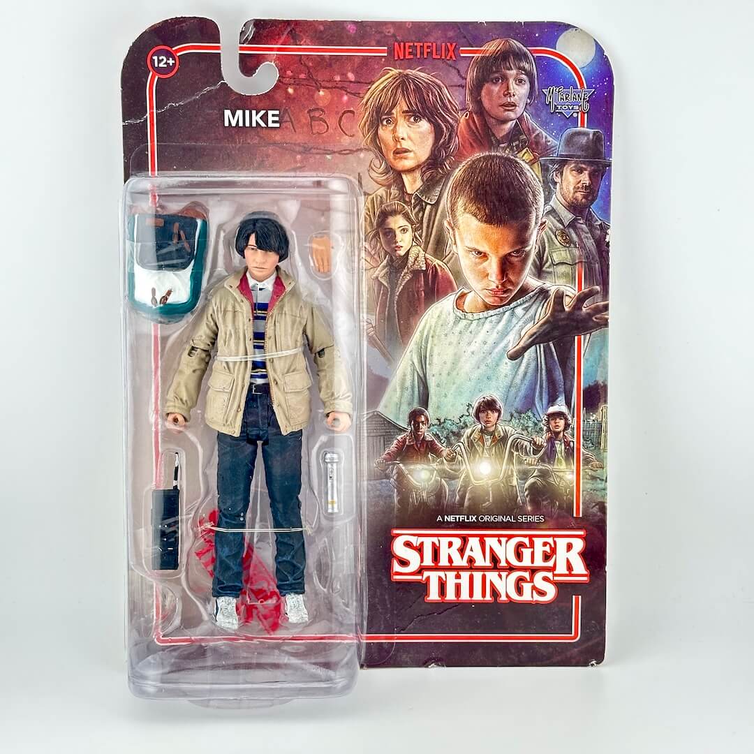 A Stranger Things Mike action figure in its original blister card packaging.