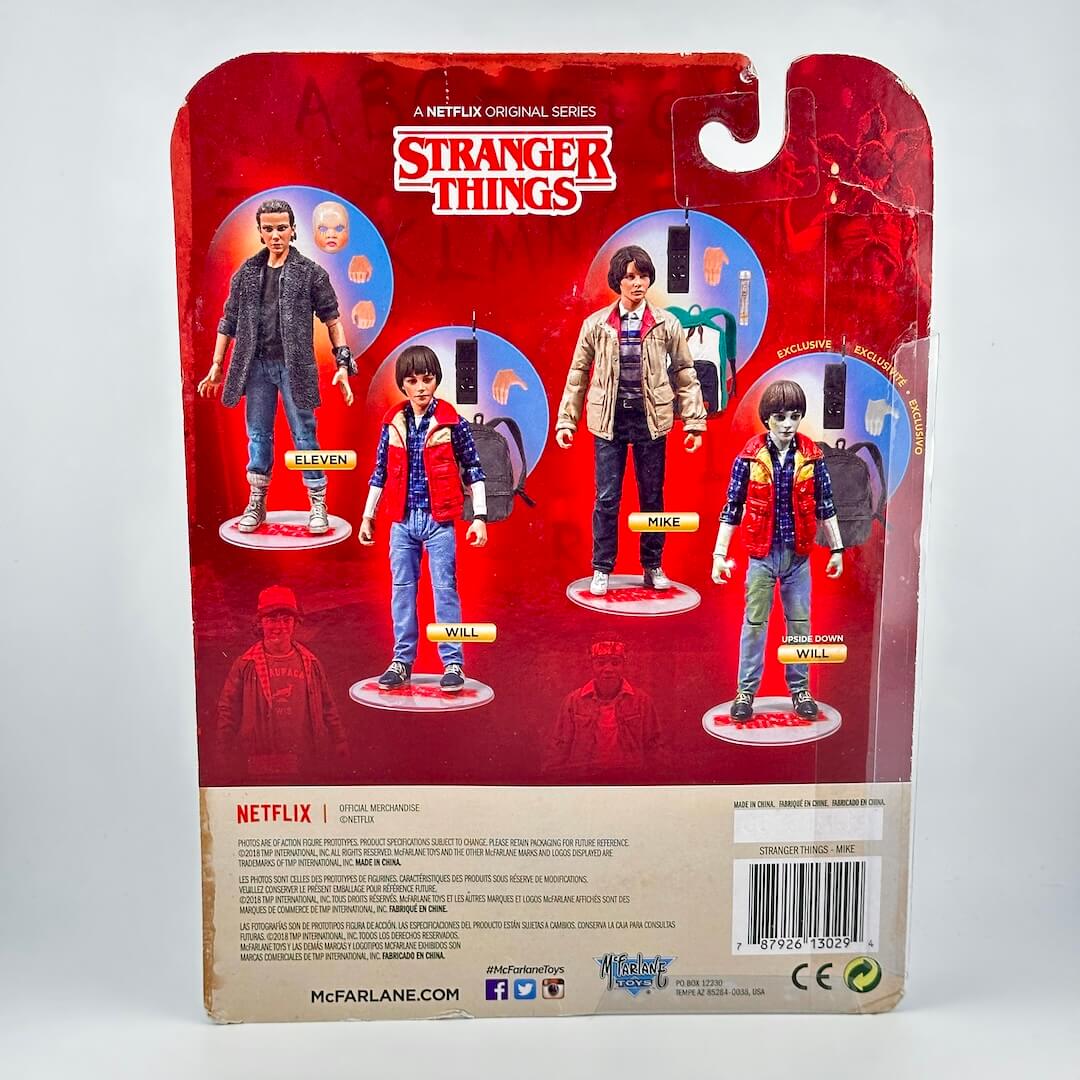 Back of a McFarlane Toys Stranger Things action figure blister card showing the four character figures available. 