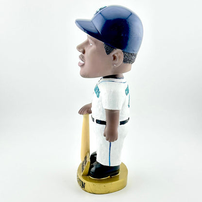 Bobblehead of a baseball player in a white uniform with a blue helmet on a white background