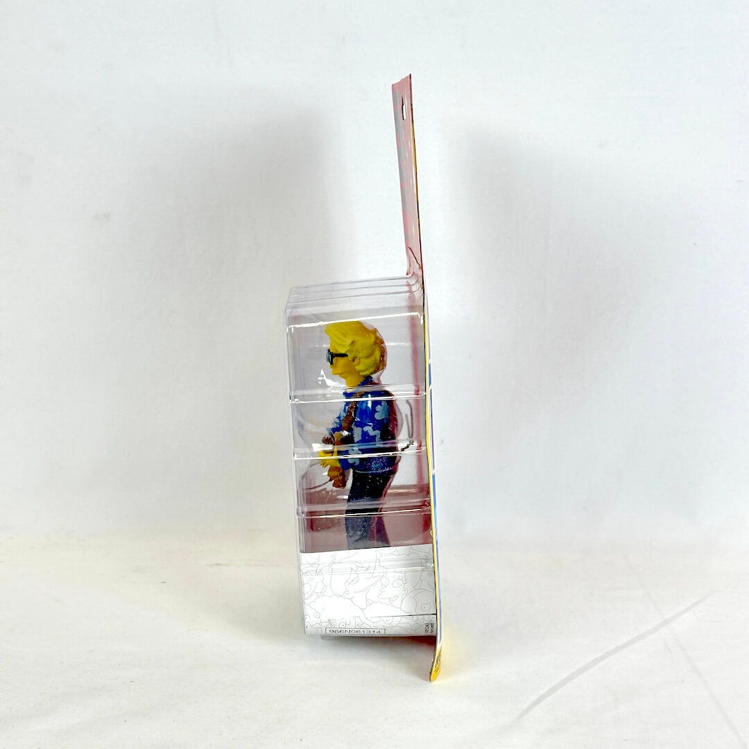 Toy figure in a clear packaging box on a white background