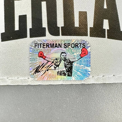 Sticker with 'Fiterman Sports' text on a gray background