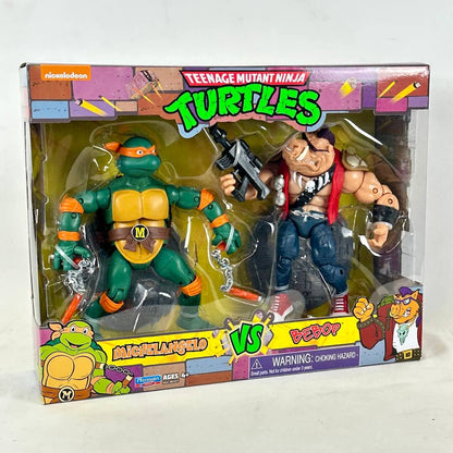 Teenage Mutant Ninja Turtles action figure set in retail packaging, featuring Michelangelo and Bebop.
