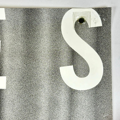 Top right corner with pin holes.