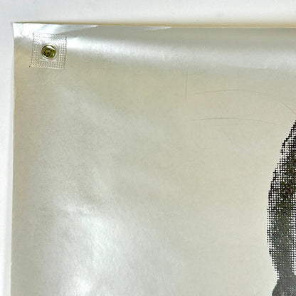 Top left corner of poster with creases and light scratches to surface. 