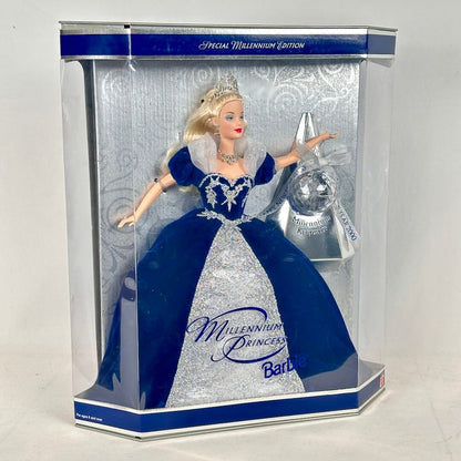 Barbie doll in blue and silver gown in packaging with 'Millennium Princess' text