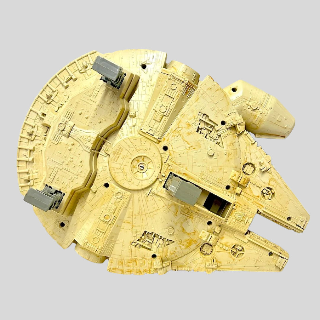 Model of the Millennium Falcon spaceship on a white background