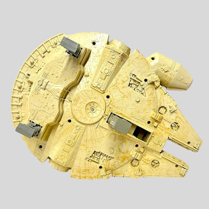Model of the Millennium Falcon spaceship on a white background