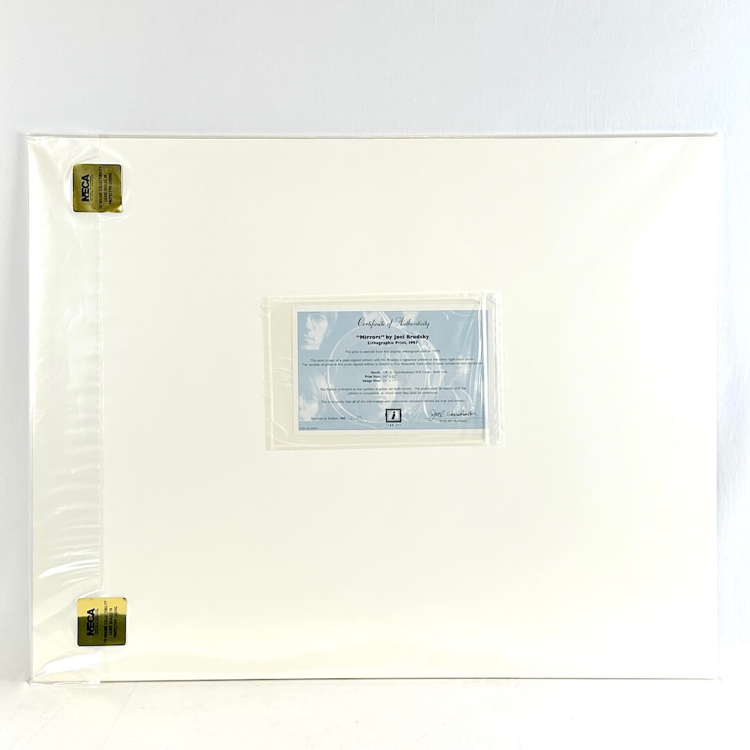 Backside of print with certificate of authenticity and gold sticker seals. 