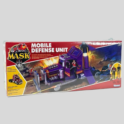 Toy packaging with "MASK" branding against white background. 