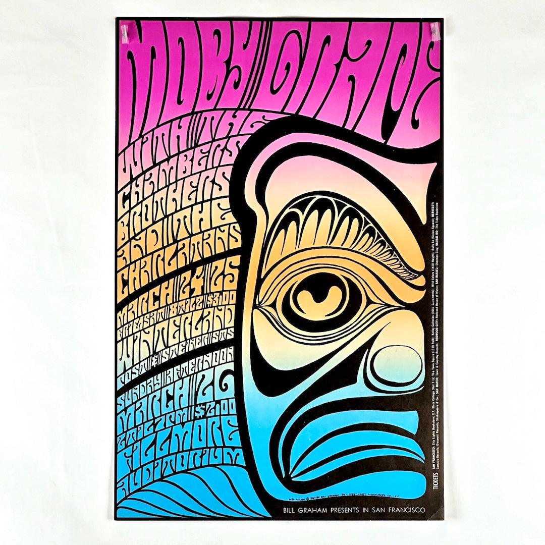 Moby Grape Fillmore concert poster from March 2-3, 1968. Psychedelic design featuring a totem-style eye motif in pink, yellow, and blue.