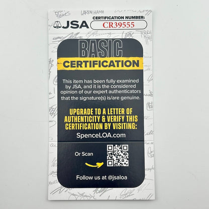 A JSA Basic Certification card with a black and yellow design, featuring text about authenticity verification and a QR code.