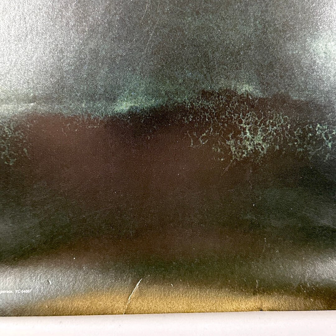 Crease to bottom edge. 