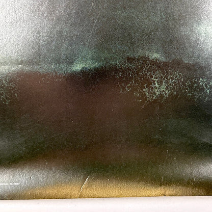 Crease to bottom edge. 