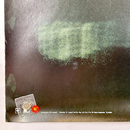 Bottom left corner with copyright information and creased corner. 